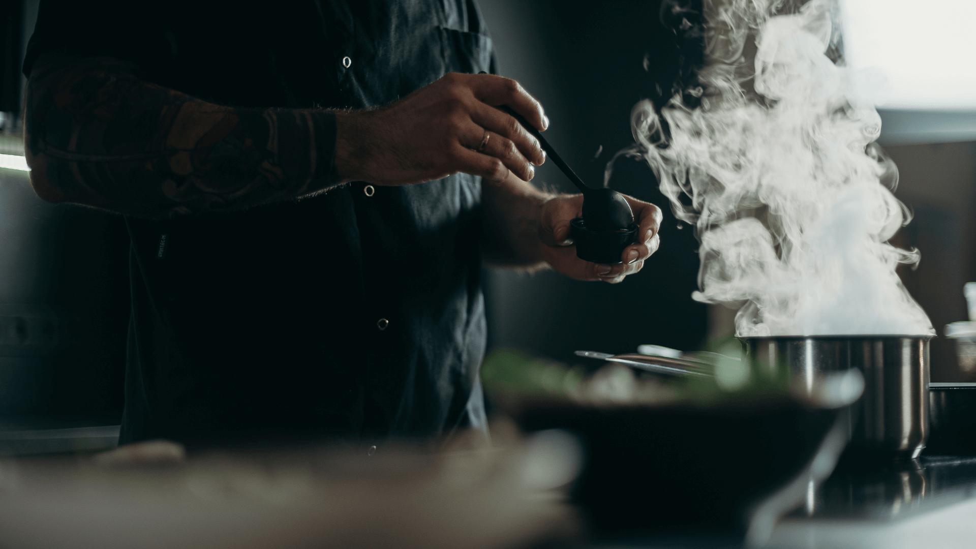 Chef preparing food in a restaurant kitchen