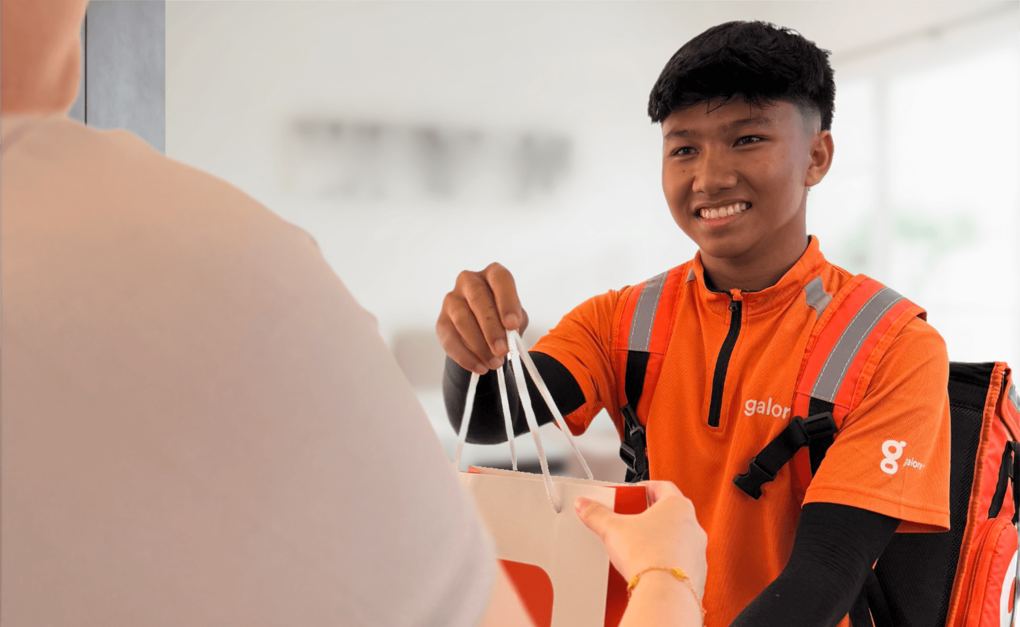 Delivery rider on a motorbike